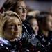 Milan junior cheerleader Miranda Kush during the National Anthem on Friday. Daniel Brenner I AnnArbor.com
